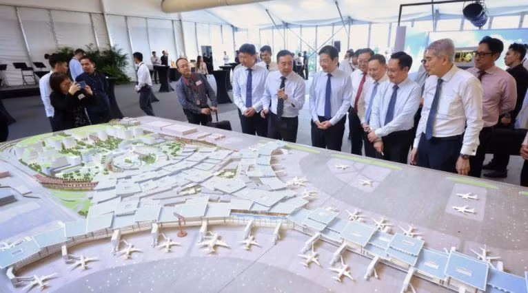 Prime Minister Lawrence Wong looking at a model of Changi Airport Terminal 5 on May 14 (Photo: The Straits Times)