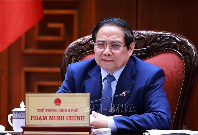 Prime Minister Pham Minh Chinh at the working session with leaders of ministries, sectors, and CT Group on August 13 (Photo: VNA)