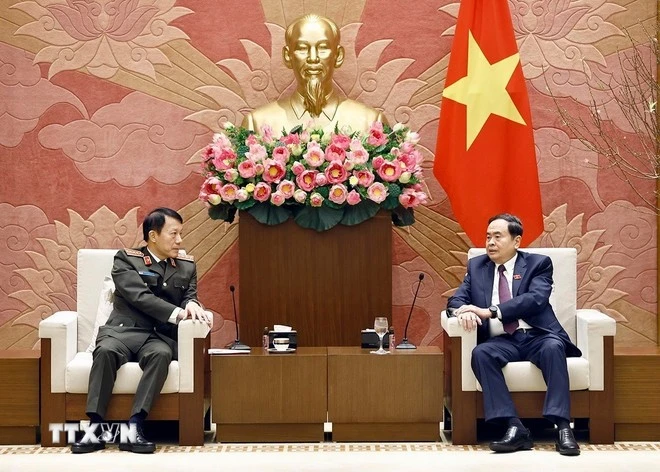 National Assembly Chairman Tran Thanh Man (R) and Minister of Public Security General Luong Tam Quang at a meeting on February 4 (Photo: VNA)