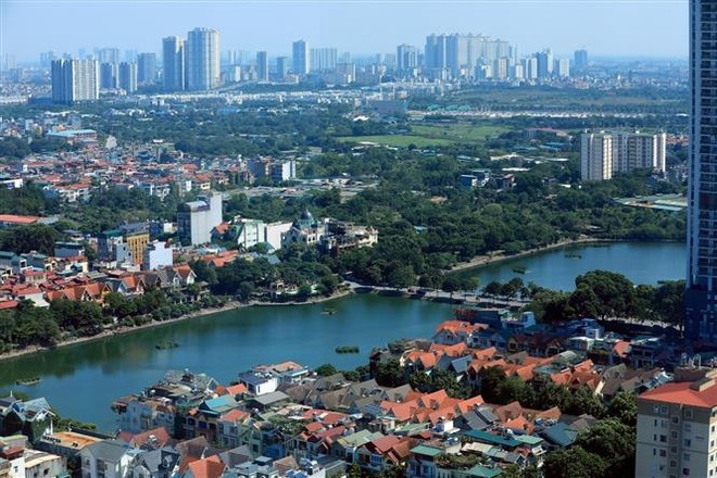 Hanoi is penning policies to attract world-class experts for the capital city's development. (Photo: VNA)
