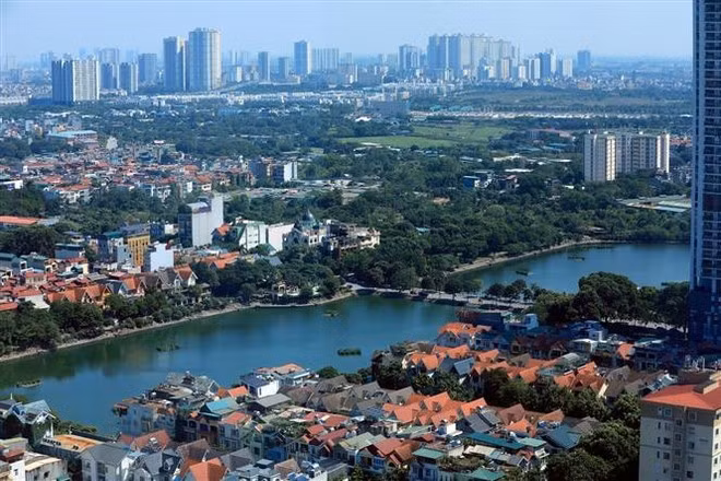 Hanoi is penning policies to attract world-class experts for the capital city's development. (Photo: VNA)