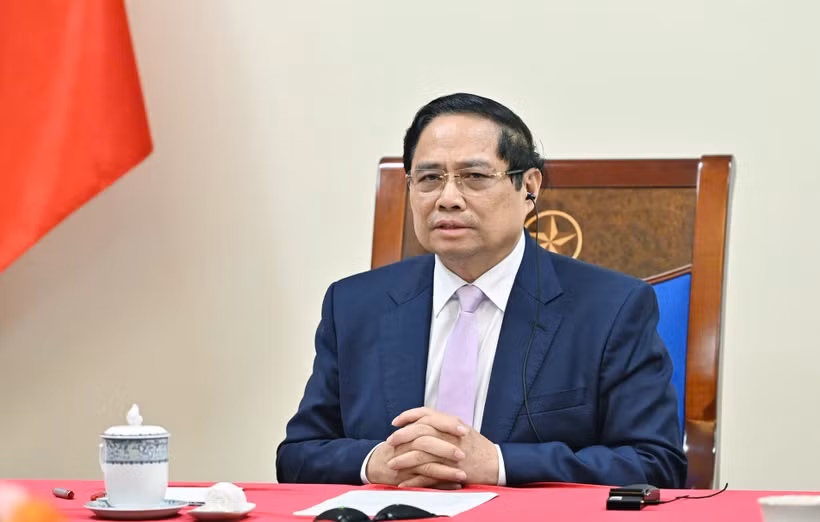 Vietnamese Prime Minister Pham Minh Chinh holds phone talks with his Malaysian counterpart Anwar Ibrahim on July 30. (Photo: VNA)