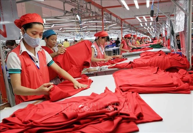 At Star Fashion Company Limited's factory specialising in the production of knitwear and sportswear for export to the US market. (Photo: VNA)