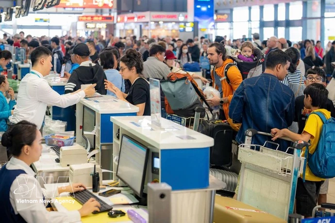 Noi Bai International Airport activates plans to accommodate rising passenger volumes during the 2026 Tet holiday. (Photo: VietnamPlus)