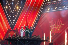 Impressive sight of 68 marching soldiers at a 50,000-strong concert