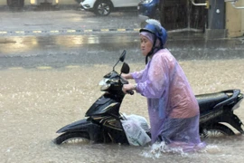 Heavy rain hits Hanoi, flooding risk remains high
