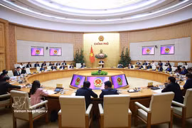 Prime Minister Pham Minh Chinh on February 22 chairs a meeting of the Government’s standing members to review Tet celebrations and implement key task for the post-holiday period. (Photo: VNA)
