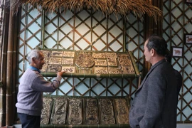 Sinh folk paintings (Photo: VNA)