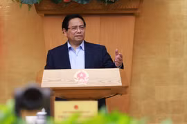 Prime Minister Pham Minh Chinh presides over the Government’s regular August meeting. (Photo: VNA)