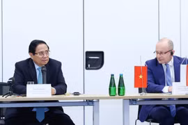 Prime Minister Pham Minh Chinh has a working session with Poland's national cybersecurity centre (Photo: VNA)