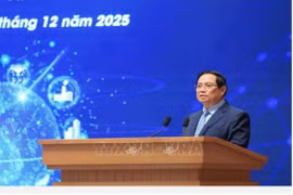 Prime Minister Pham Minh Chinh addresses the third National Forum on Digital Economy and Digital Society in Hanoi on December 20. (Photo: VNA)