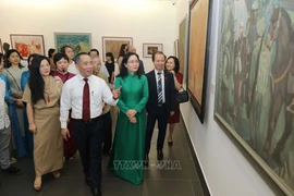 Delegates visit the exhibition (Photo: VNA)