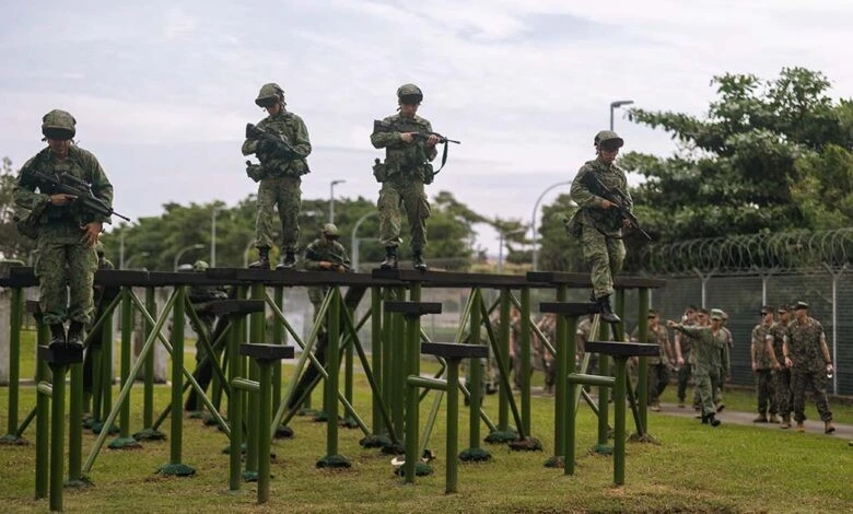 Singapore guardsmen complete an obstacle course during exercise Valiant Mark with U.S. Marine Rotational Force-Southeast Asia in Singapore in December 2024. (Photo: SGT. SHAINA JUPITER/U.S. MARINE CORPS)