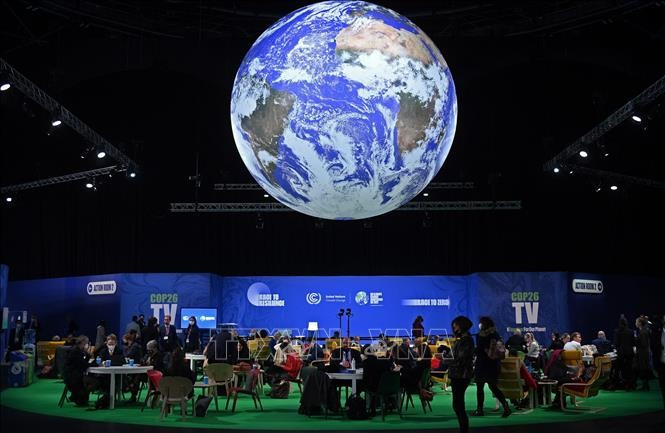 Delegates attend COP26 in Glasgow on November 2, 2021. (Photo: AFP/VNA)