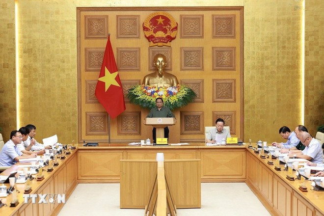 Prime Minister Pham Minh Chinh chairs the 15th meeting of the National Steering Committee for Combating Illegal, Unreported and Unregulated (IUU) Fishing. (Source: VNA)