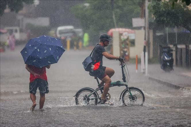 Flooding in Quezon, the Philippines, following heavy rains triggered by Typhoon Wipha. (Photo: Xinhua)