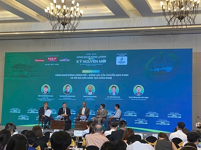 Participants take part in a discussion at the event. (Photo: VNA)