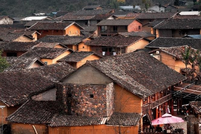 Yin-yang tiled roofs - Typical charm of Lo Lo people’s houses. (Photo: VNA)