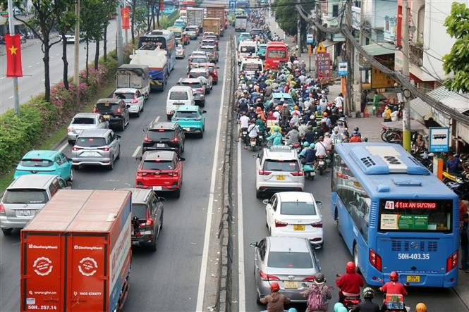 National Highway 22 carries a high volume of vehicles. The section from the An Suong intersection to Ring Road No. 3 will be expanded under the BOT model. (Photo: VNA)