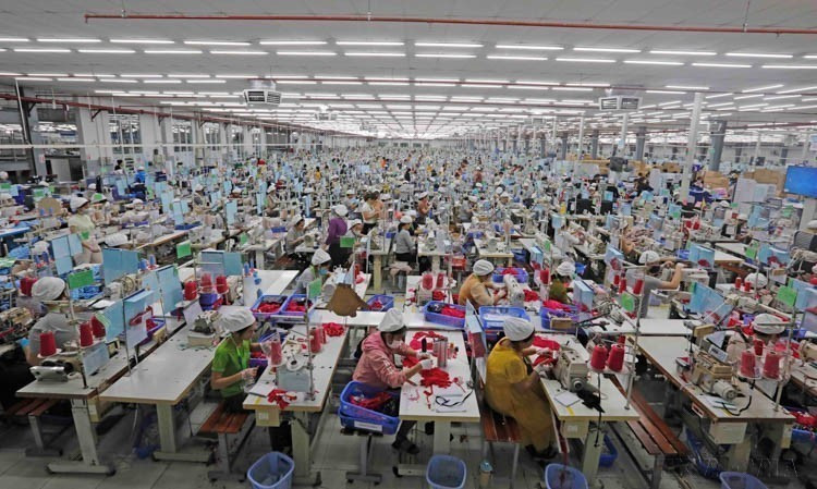 SCAVI Hue Company, 100% invested by France’s Financière B'Lao Group, specializes in manufacturing garments, underwear, sportswear, protective clothing in Phong Dien Industrial Park, Phong Dien District, Thua Thien Hue Province. (Photo: VNA)