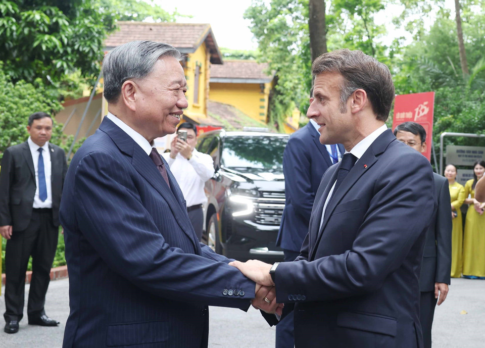 Party General Secretary To Lam and French President Emmanuel Macron. (Photo: VNA)