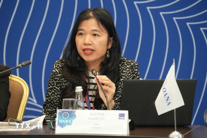 Head of Vietnam News' News Department Nguyen Khanh Chi delivers a speech at the 19th OANA General Assembly. (Photo: VNA)