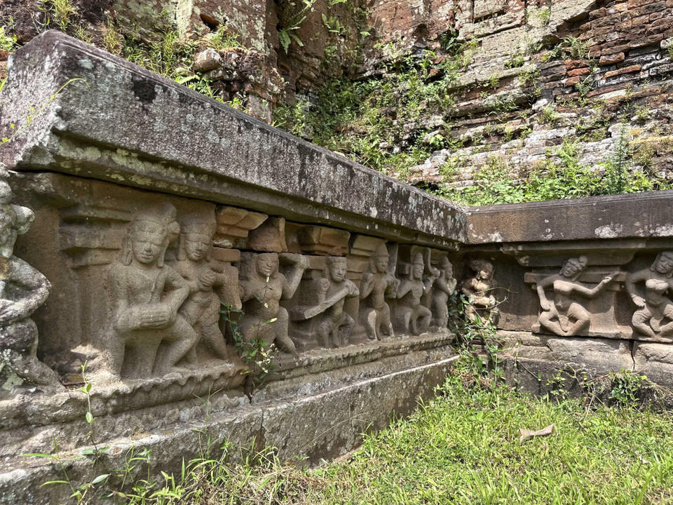Sandstone reliefs at Chien Dan depict Cham dancers performing traditional movements from ancient rituals. (Photo: VNA)