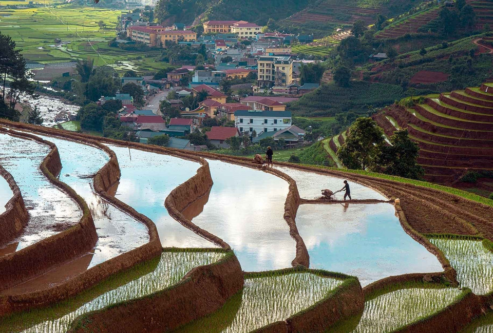 Terraced fields during the water-pouring season in Mu Cang Chai commune, Lao Cai province. (Photo: VNA)