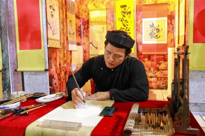 A calligraphy booth at the Hanoi Autumn space. (Photo: VNA)