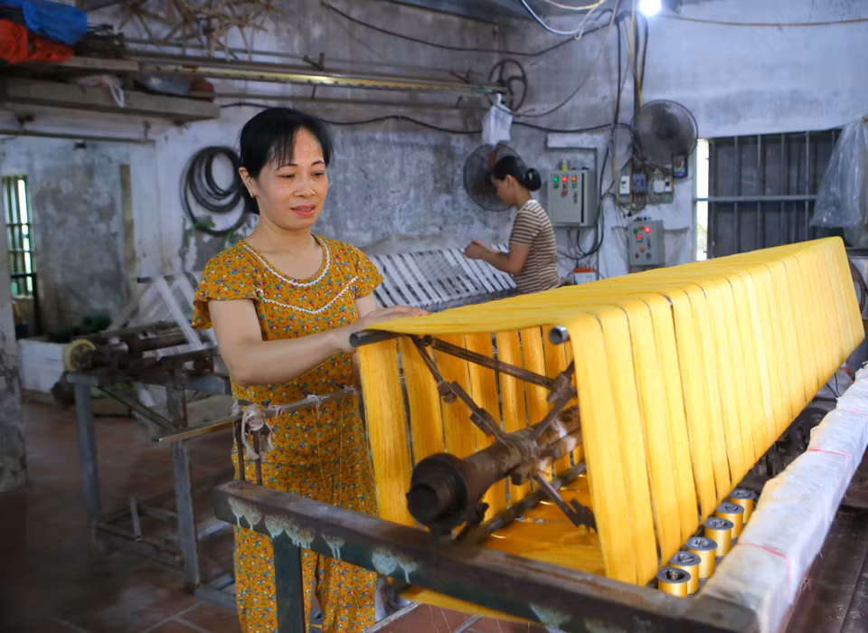 The silk-reeling process. (Photo: VNA)