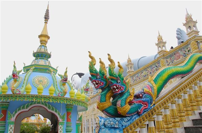 The pagoda stands out with its exquisite architecture, featuring symbolic motifs of the Naga serpent and the Krud bird. (Photo: VNA)