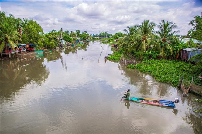 The simple riverside life along a branch of the Vam Co Dong River captures the rustic, peaceful charm of Tay Ninh’s waterways. (Photo: VNA)