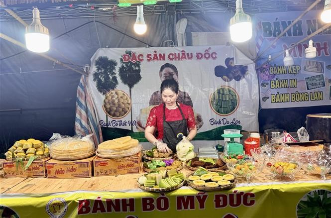 Display area featuring dozens of signature cakes from An Giang. (Photo: VNA)