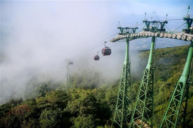 A modern cable car system carries visitors through the clouds to the peak of Ba Den Mountain, dubbed the “roof of the South.” (Photo: VNA)