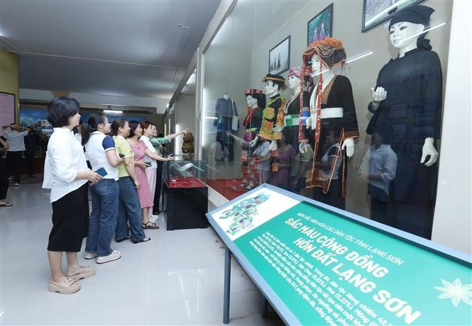Visitors explore the cultural beauty of local land and people at the Lang Son Provincial Museum. (Photo: VNA)