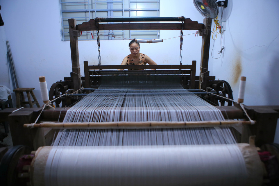 A traditional silk-reeling workshop in Co Chat village, Ninh Giang commune, Ninh Binh province. (Photo: VNA)