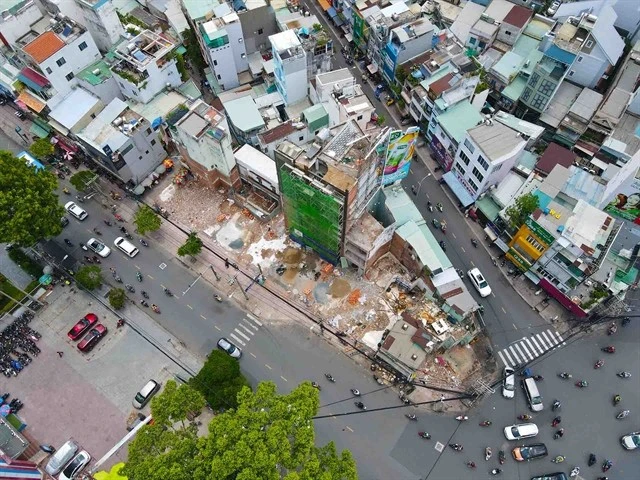 Aerial view of cleared land and ongoing demolition at the site of HCM City's Metro Line 2 project. (Photo: thesaigontimes.vn)