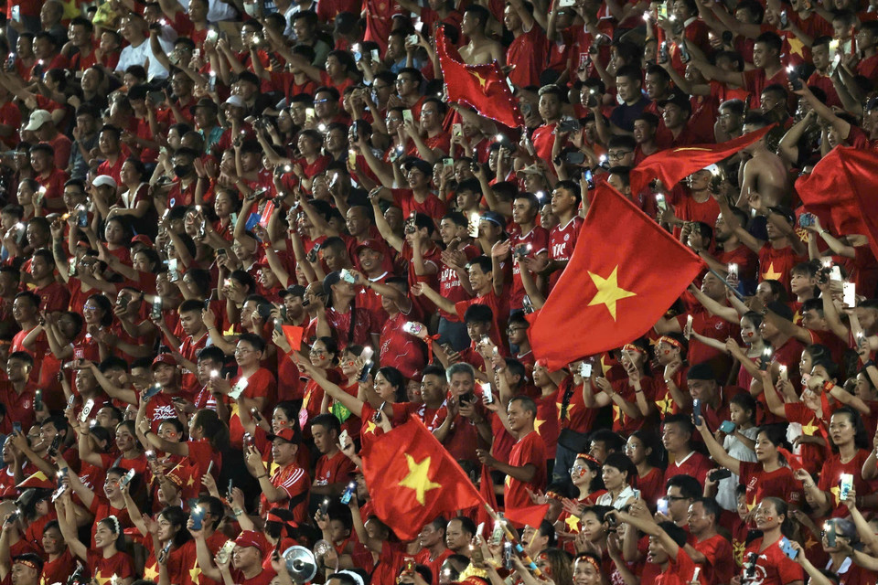 Fans cheer for the Vietnam women’s national football team. (Photo: Pham Hau - VNA)