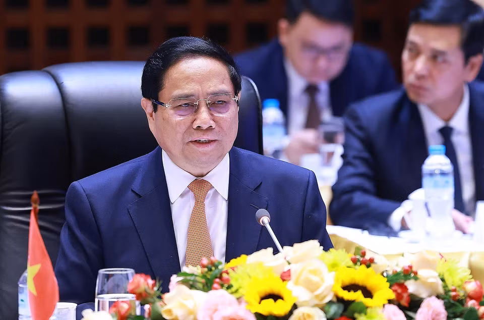 Prime Minister Pham Minh Chinh delivers a speech at the 47th meeting of the Vietnam-Laos Intergovernmental Committee for Bilateral Cooperation. (Photo: Duong Giang - VNA)