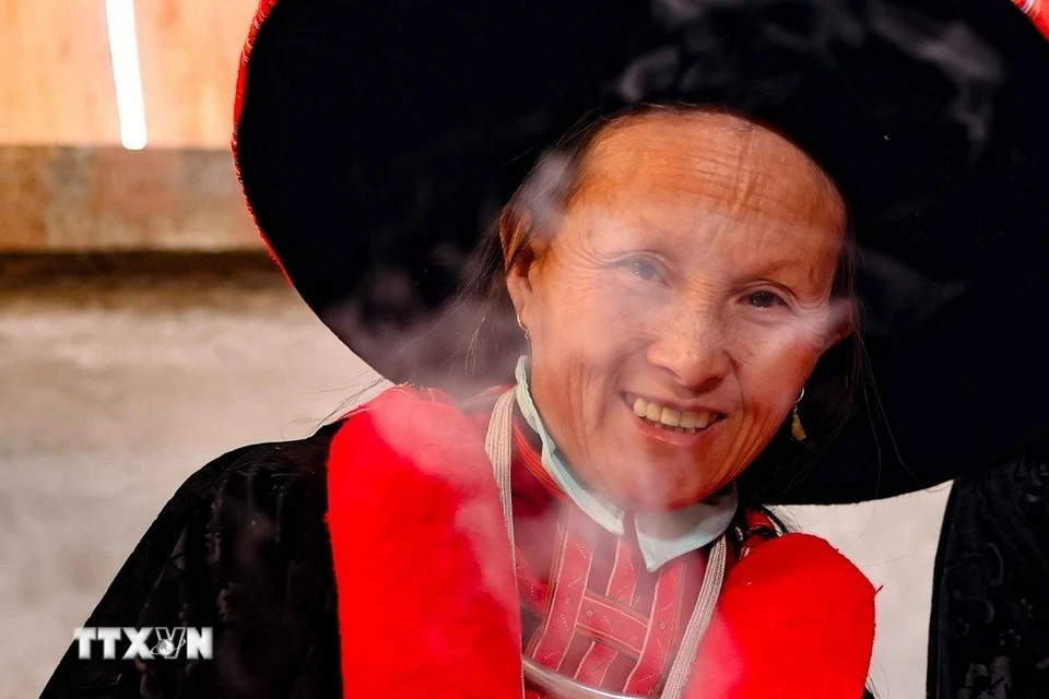 One of the unique cultural traditions of the Dao people in Vietnam is their culinary practices, particularly the preparation of "banh chung gu" and other special dishes for Tet. (Photo: Thanh Tung/VNA)