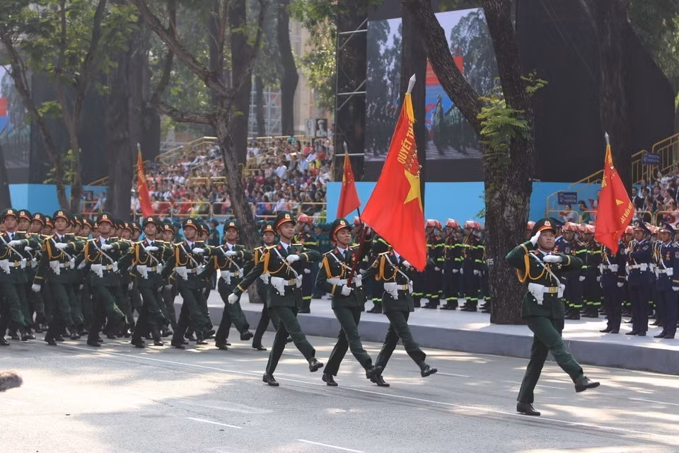 The Army officers march past the grandstand. Photo: VNA
