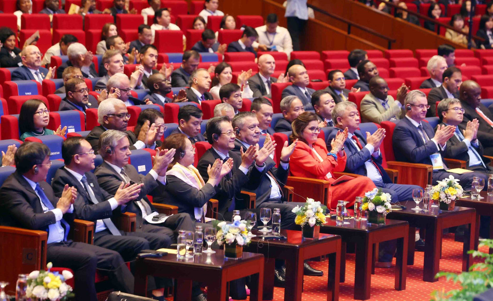 Minister of Public Security Lương Tam Quang and delegates attend the closing session of the United Nations Convention against Cybercrime (the Hanoi Convention) signing ceremony. (Photo: Pham Kien – VNA