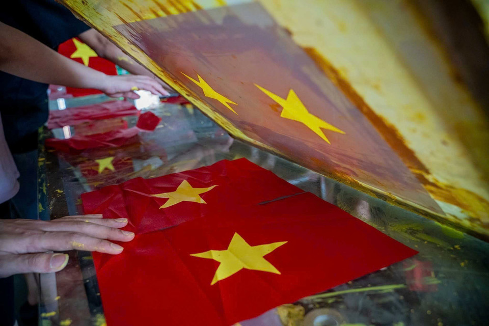 Every stage and every flag is completed with meticulous attention to detail by villagers. (Photo: VNA)