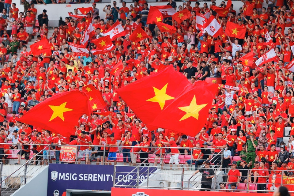 Fans cheer for the Vietnam women’s national team. (Photo: Pham Hau - VNA)