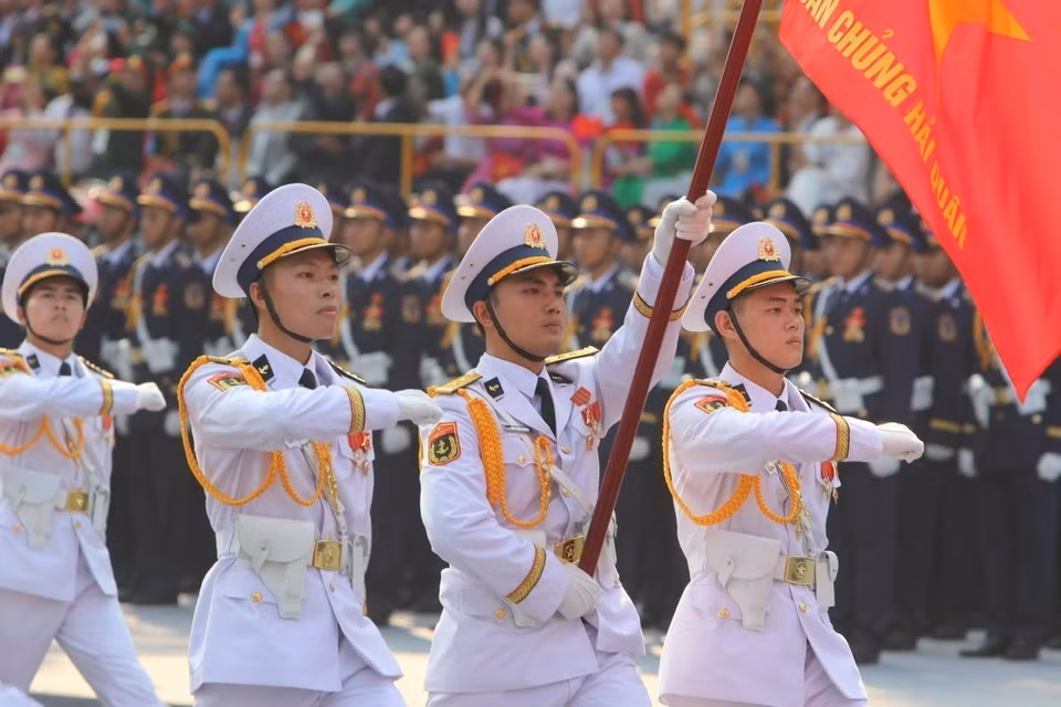 The Navy officers march past the grandstand. Photo: VNA