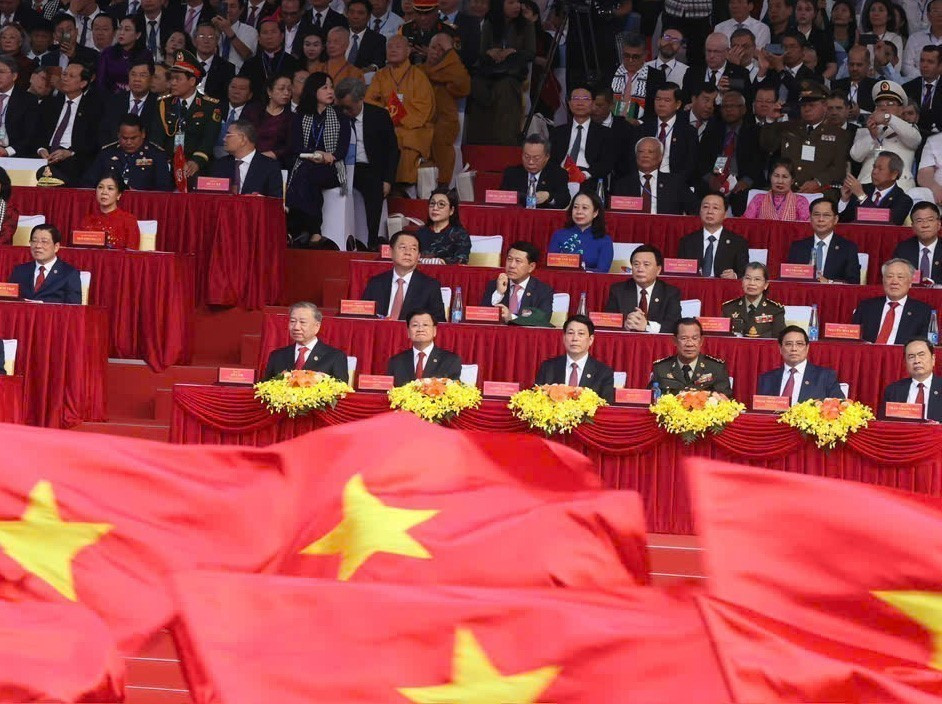 Party General Secretary To Lam, along with incumbent and former leaders of the Party and State, international guests, and delegates, attend the ceremony. Photo: VNA