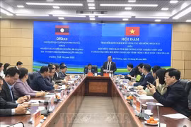 At the meeting between the People's Councils of Hai Duong and Vientiane provinces. (Photo: VNA)