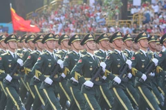 Neighbour military forces join Vietnam's full dress rehearsal for the 50th anniversary of national reunification