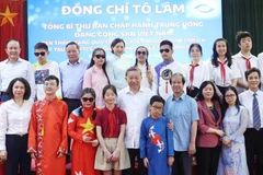 Party chief visits two schools for students with disabilities in Hanoi