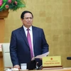 Prime Minister Pham Minh Chinh speaks at the 26th meeting of the National Steering Committee for Combating Illegal, Unreported and Unregulated (IUU) Fishing. (Photo: VNA)